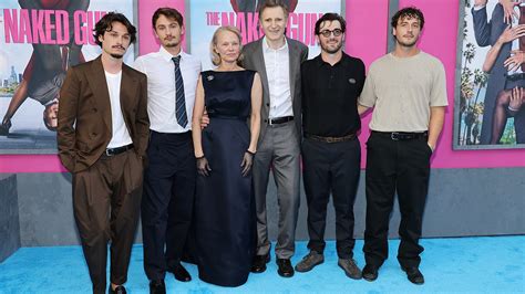 Pamela Anderson And Liam Neeson Supported By Their Adult Sons At The Naked Gun Premiere Amid