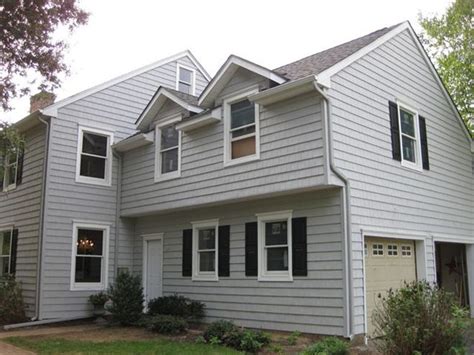 Пластиковый сайдинг на фасад: монтаж, варианты отделки под дерево