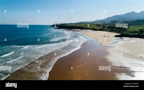 Aerial view of sandy coastal beach Stock Photo - Alamy