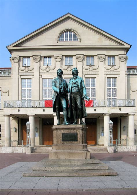 Statue Of German Poets Goethe And Schiller In Front Of The Weimar