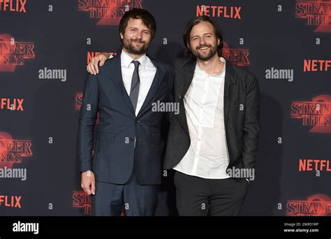 Directors Ross Duffer Left And Matt Duffer Arrive At The Premiere Of Stranger Things Season