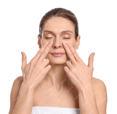 Premium Photo Woman Massaging Her Face On White Background