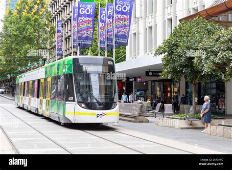 Melbourne Tram Travels Along Bourke Street In Melbourne City Centre