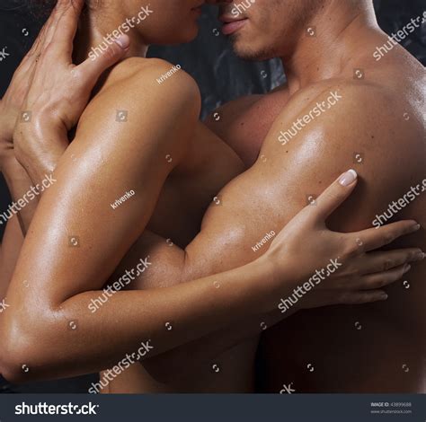 Loving Affectionate Nude Heterosexual Couple Engaging Stock Photo