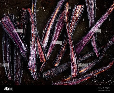 Roasted Purple Carrots Stock Photo Alamy
