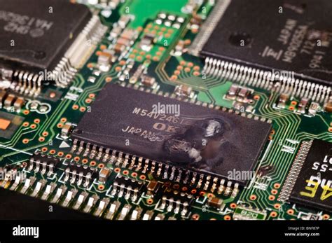 Electronic Integrated Circuit IC On A Computer PCB After Suffering