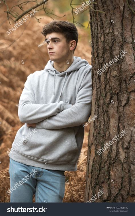 Teenage Boy Leaning Against Tree On Stock Photo 1023398830 Shutterstock