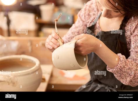 Potter In Workshop Working On Earthenware Pot Stock Photo Alamy