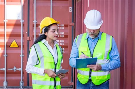 Premium Photo | Engineers wearing safe uniform with radio communication ...