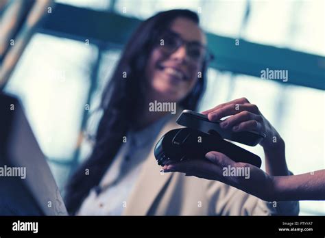 Cheerful Brunette Girl Looking At Her Waiter Stock Photo Alamy