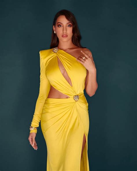 Nora Fatehi In Yellow Dress Flaunts Her Fine Curves And Sexy Legs See New Hot Photos
