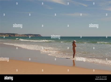 Mature Nude Woman At The Beach Stock Photo Alamy