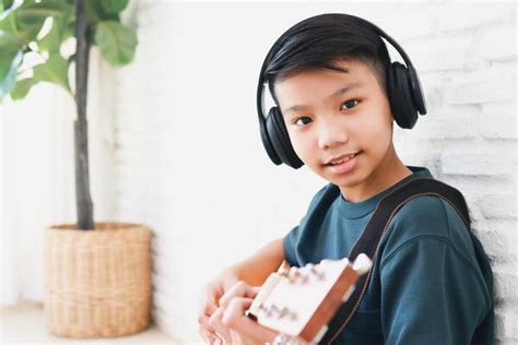 Boy With Guitar Stock Photos Images And Backgrounds For Free Download