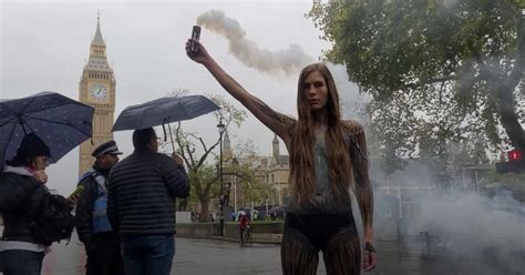Woman Marches Through London Almost Naked To Save Birds Izzso News Travels Fast