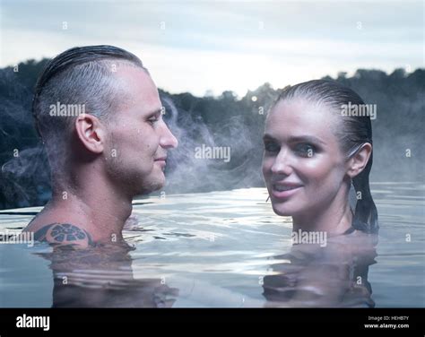 Hot Spring Geothermal Spa On Iceland Romantic Couple In Love Relaxing In Hot Pool On Iceland
