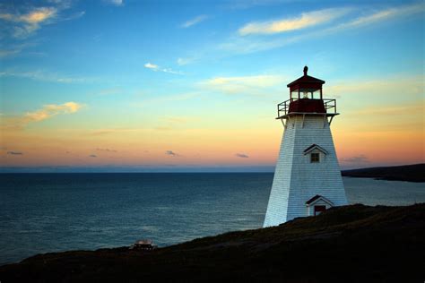 Lighthouse Sunset Coast Royalty Free Photo