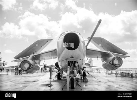 A Grayscale Shot Of A Jet On The Uss Yorktown At Patriots Point Stock