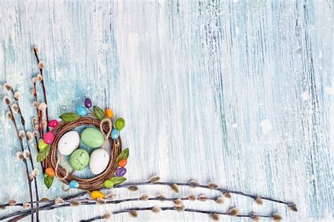 Premium Photo Easter Background Pussy Willow Branches And Decorative Easter Eggs On Light