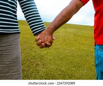 Gay Couple Holding Hands Grass Field Stock Photo Shutterstock