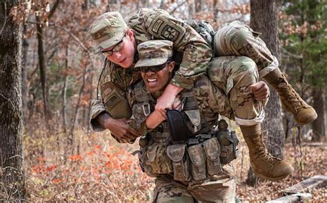 University Of Iowa Cadet Trejahn Manning Carries Teammates Joseph