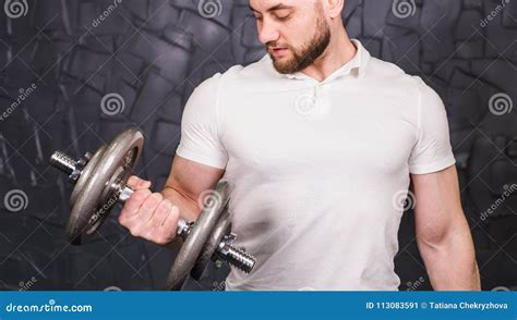 Muscular Man Working Out In Gym Doing Exercises With Dumbbells At Biceps Strong Male Naked