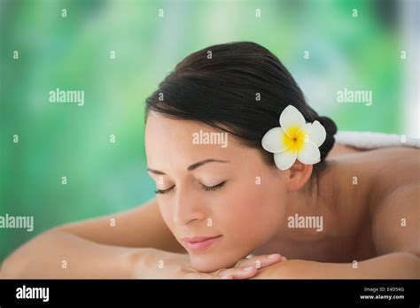 Beautiful Brunette Relaxing On Massage Table Stock Photo Alamy
