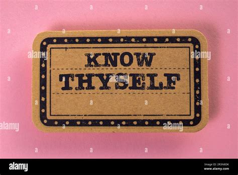 Know Thyself Cardboard Sticker With Text On A Pink Background Stock