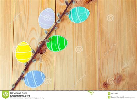 Close Up Of Pussy Willow Branches And Colorful Paper Eggs Silhouette Frames Against Wooden