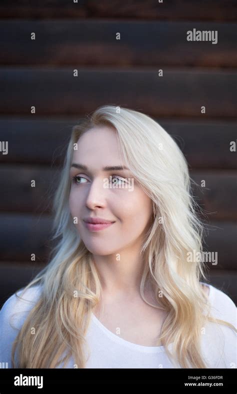 Scandinavian Blonde Woman Posing On Wood Background Stock Photo Alamy