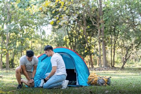 Premium Photo Male Gay Couple Asian Traveling With Tent Camping Outdoor And Various Adventure