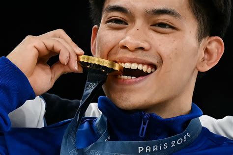 Overwhelmed Yulo Wins Historic Gymnastics Olympic Gold For Philippines