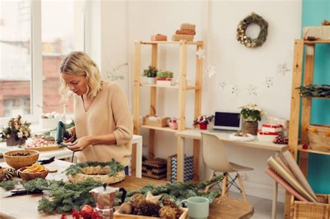 Premium Photo Craftswoman Using Hot Glue Gun