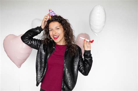 Premium Photo Sexy Brunette Girl Posing With Heart Shaped Balloons On A White Background