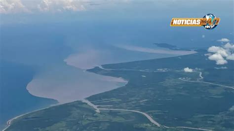 IMÁGENES Impresionante desembocadura del Río Chamelecon tiñe de barro