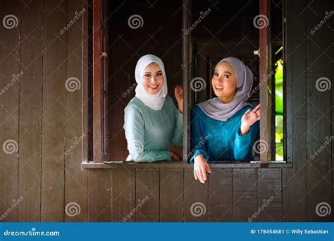 Portrait of Muslim Malay Women Wearing Hijab and Traditional Costume 