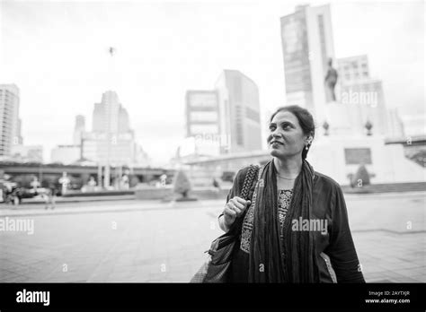 Portrait Of Mature Beautiful Indian Woman Exploring The City Stock