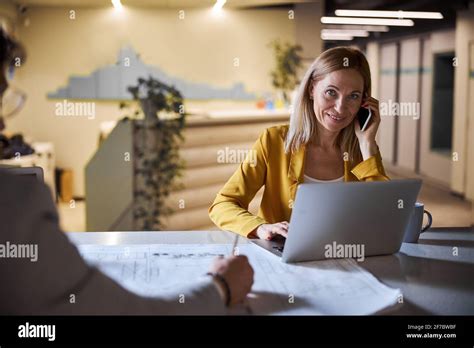 Positive Delighted Blonde Woman Talking Per Telephone Stock Photo Alamy