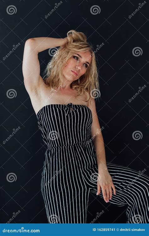Beautiful Fashionable Blonde Woman In Striped Jumpsuit Stock Image Image Of Lady Girl