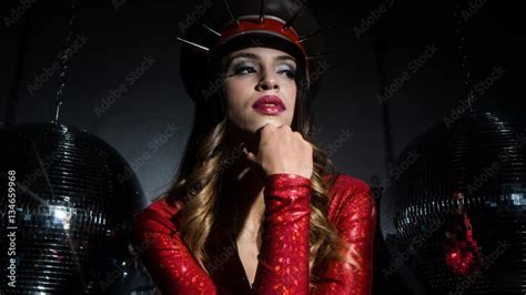 Sexy Cool Latina Woman Posing In Amazing Red Catsuit And Spiked Military Hat Stock Video Adobe