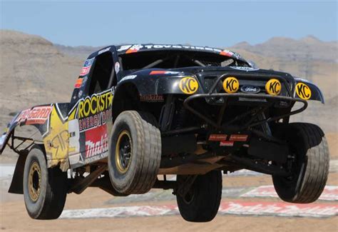 Pit Stop Automobiles: Off Road Racing Trucks Showcase