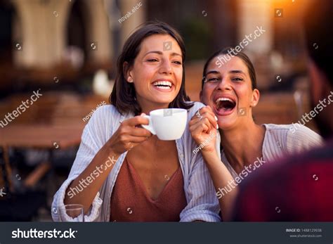 Smiling Friends Drinking Coffee Laughing Shutterstock