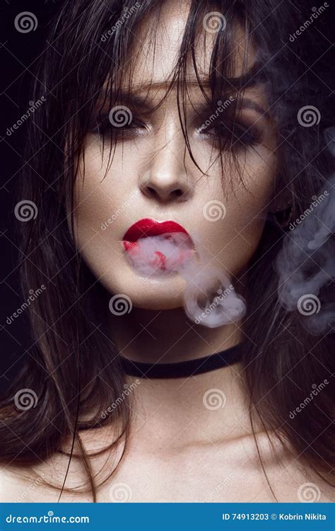Beautiful Brunette Girl With Bright Makeup Red Lips Smoke From Mouth Beauty Face Stock Image