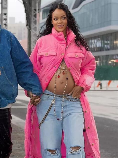 Rihannas Pink Puffer Coat Stole The Show During Her Baby Bump Debut