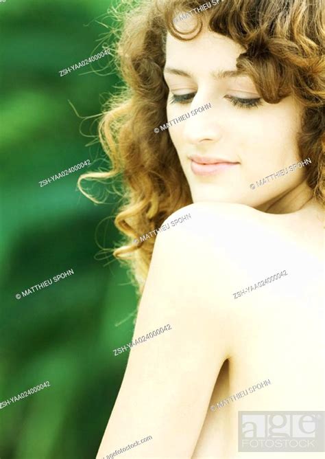 Nude Woman Looking Over Shoulder Rear View Close Up Stock Photo