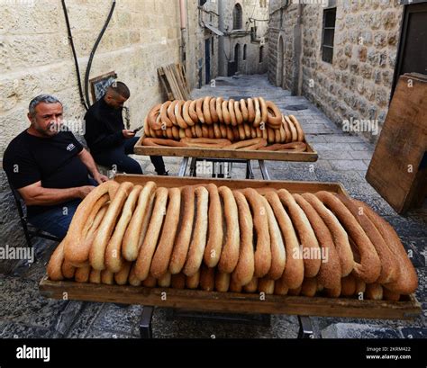 Fresh Kaek Al Quds Sesame Bagel Bread Being Delivered On A