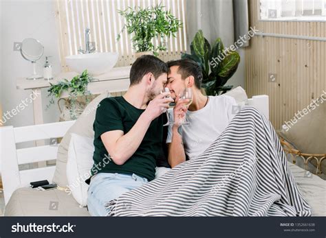 Happy Gay Couple Lying On Bed Stock Photo Shutterstock