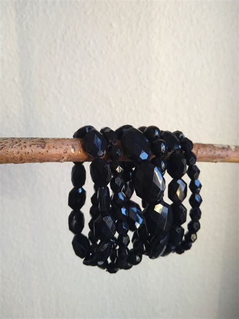 Sex svarta armband Resår Blanka Köp på Tradera