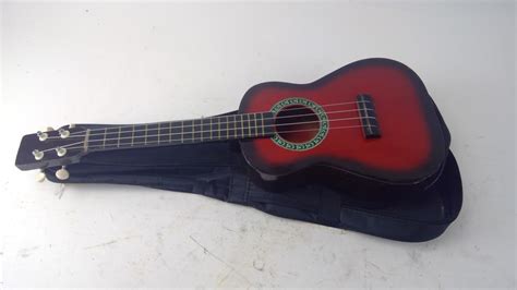 Mini Acoustic Guitar | Property Room