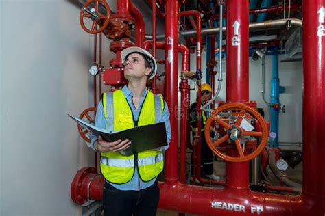 Engineer Or Technician Work Checking Fire Suppression System And Fire
