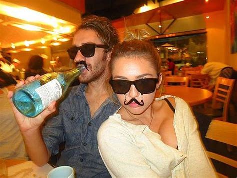 Miley Cyrus Exposing Her Tattoo And Boobs In See Thru Porn Pictures XXX Photos Sex Images